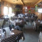 Our dining room. Enjoy the fireplace or a seat by a window.